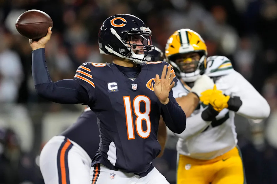 Caleb Williams led the Chicago Bears to a win over the Green Bay Packers in a late-season game at Soldier Field. (Photo by Patrick McDermott/Getty Images)