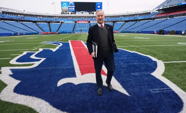 Chris Clark, Buffalo Bills Vice President of Security walks on the field at Highmark Stadium before an NFL football game between the Philadelphia Eagles and Buffalo Bills, Sunday, Dec. 28, 2025. (AP Photo/Gene J. Puskar)