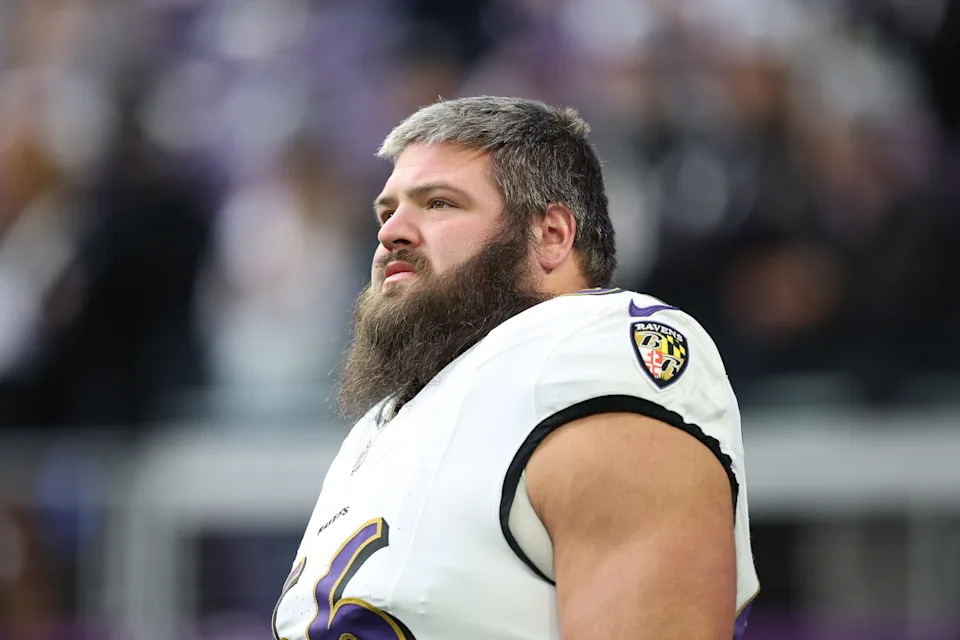 Ben Cleveland #66 of the Baltimore Ravens looks on during warmups before the game against the Minnesota Vikings