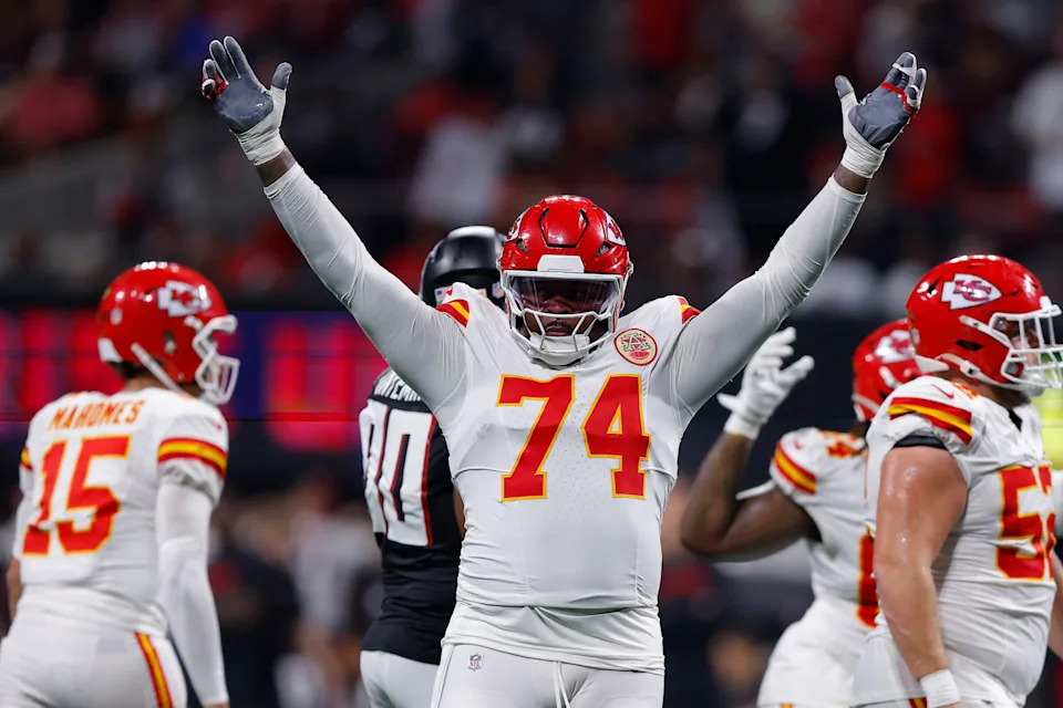 ATLANTA, GEORGIA - SEPTEMBER 22: Jawaan Taylor #74 of the Kansas City Chiefs celebrates the touchdown of JuJu Smith-Schuster #9 of the Kansas City Chiefs during the third quarter against the Atlanta Falcons at Mercedes-Benz Stadium on September 22, 2024 in Atlanta, Georgia. (Photo by Todd Kirkland/Getty Images)