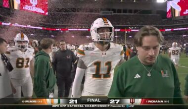 Carson Beck walking off the field