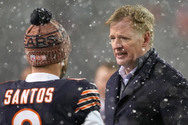 Bears kicker Cairo Santos speaks to NFL Commissioner Roger Goodell before the NFC wild-card playoff game against the Packers at Soldier Field on Jan. 10, 2026. (Patrick McDermott/Getty)