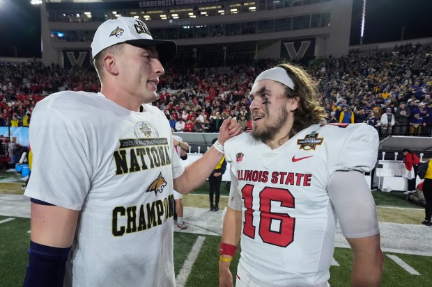 Montana State quarterback Justin Lamson, left, talks to Illinois State quarterback Tommy Rittenhouse (16) after the FCS Championship NCAA college football game Monday, Jan. 5, 2026, in Nashville, Tenn. (AP Photo/George Walker IV)