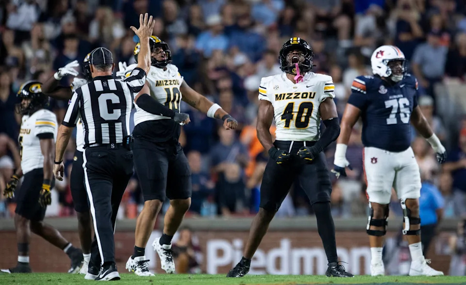 Missouri Tigers linebacker Josiah Trotter (40) celebrates a defensive stop as Auburn Tigers take on Missouri Tigers at Jordan-Hare Stadium in Auburn, Ala. on Saturday, Oct. 18, 2025. Missouri Tigers defeated the Auburn Tigers 23-17 in 2OT.