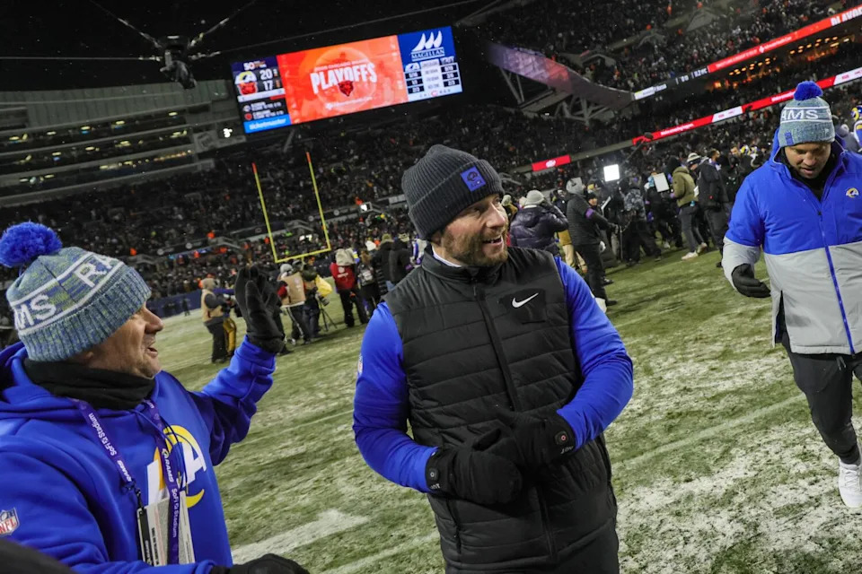 Rams coach Sean McVay smiles as he walks off the field following a 20-17 overtime victory against the Chicago Bears.