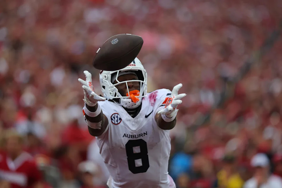 NORMAN, OK - SEPTEMBER 20: Auburn wide receiver Cam Coleman (8) reaches for a pass during the college football game between the Oklahoma Sooners and the Auburn Tigers on September 20, 2025, at Gaylord Family Oklahoma Memorial Stadium in Norman, OK. (Photo by Chad Hamilton/Icon Sportswire via Getty Images)