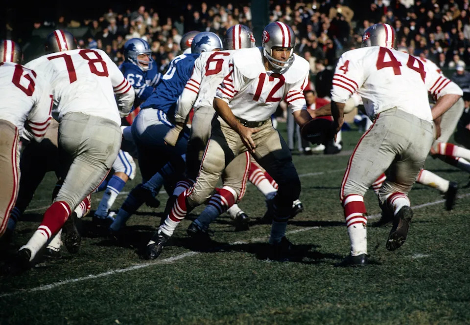 San Francisco 49ers quarterback John Brodie in action against the Detroit Lions at Tiger Stadium.