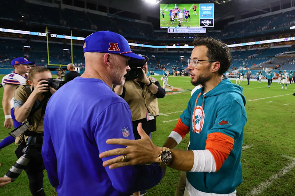 Sep 12, 2024; Miami Gardens, Florida, USA; Miami Dolphins head coach Mike McDaniel shakes hands with Buffalo Bills head coach Sean McDermott after the game at Hard Rock Stadium. Mandatory Credit: Sam Navarro-Imagn Images