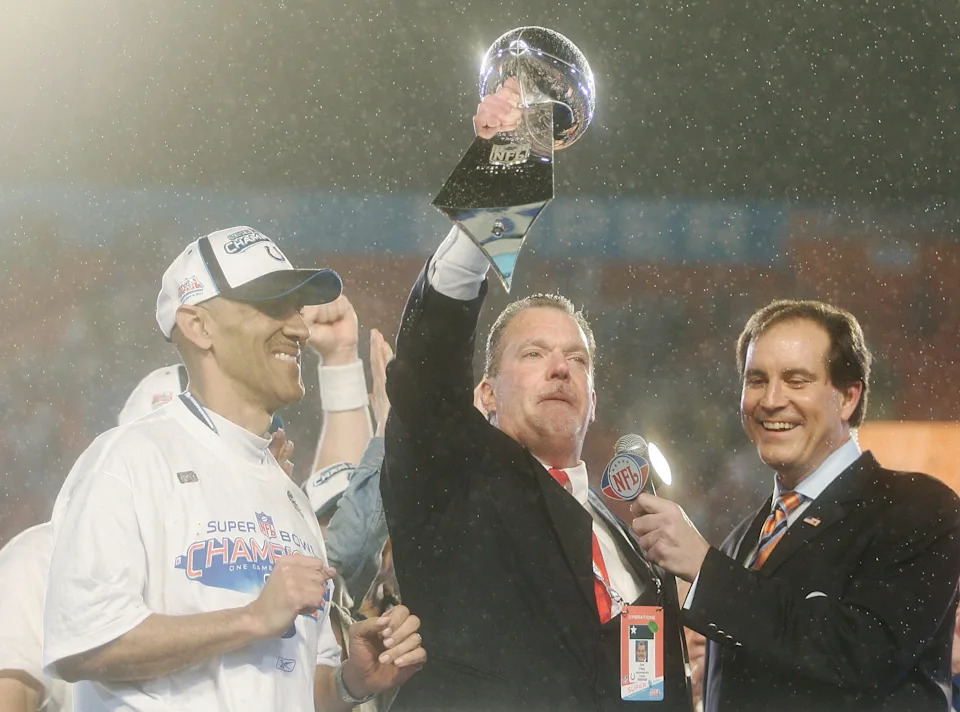 MIAMI GARDENS, FL - FEBRUARY 04:  Team owner Jim Irsay of the Indianapolis Colts hoists the Lombardi Super Bowl trophy as he celebrates with head coach Tony Dungy after the Colts 29-17 win against the Chicago Bears in Super Bowl XLI on February 4, 2007 at Dolphin Stadium in Miami Gardens, Florida.  (Photo by Donald Miralle/Getty Images)