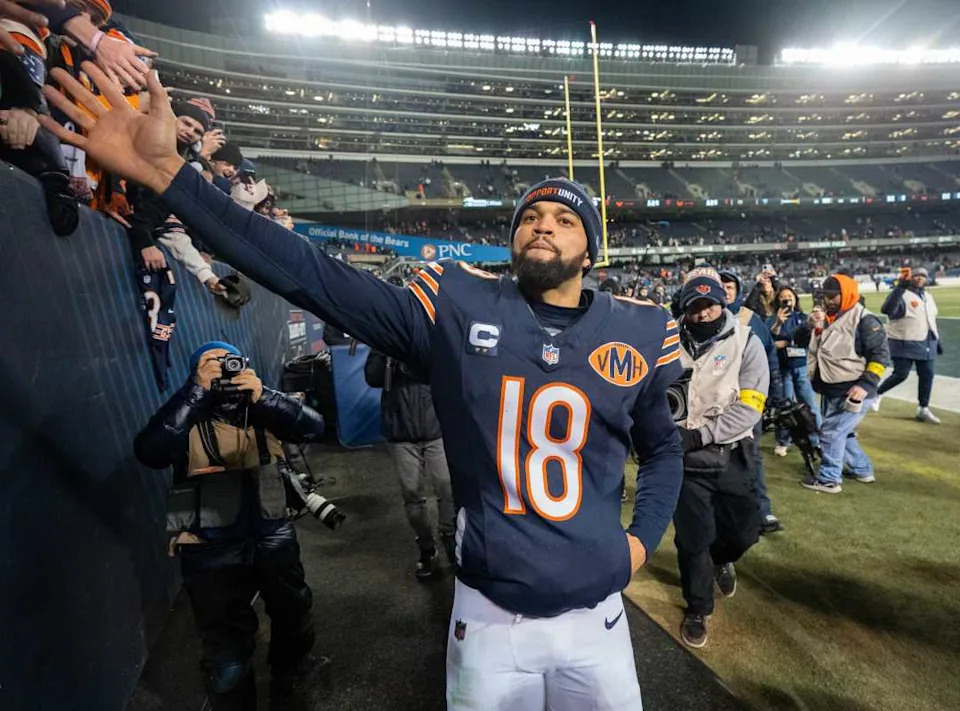 Chicago Bears quarterback Caleb Williams (18) high fives fans after their game Saturday, December 20, 2025 at Soldier Field in Chicago, Illinois. The Chicago Bears beat the Green Bay Packers 22-16 in overtime.© Mark Hoffman&sol;Milwaukee Journal Sentinel &sol; USA TODAY NETWORK via Imagn Images&period;