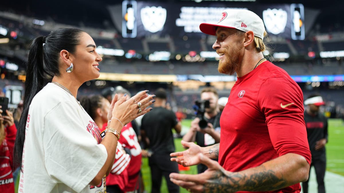 George Kittle greets his wife