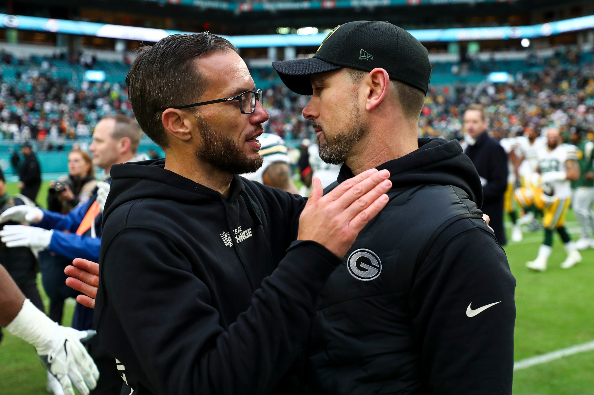 MIAMI GARDENS, FL - DECEMBER 25: Head coach Mike McDaniel of the Miami Dolphins shakes hands with head coach Matt LaFleur of the Green Bay Packers after of an NFL football game at Hard Rock Stadium on December 25, 2022 in Miami Gardens, Florida. (Photo by Kevin Sabitus/Getty Images)