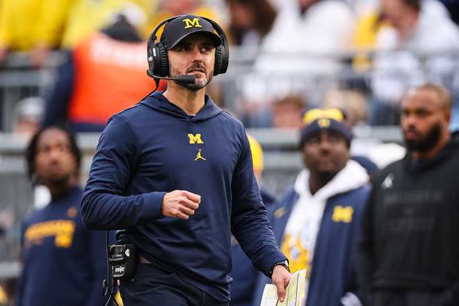 STATE COLLEGE, PA - NOVEMBER 11: Defensive coordinator Jesse Minter of the Michigan Wolverines looks on from the sidelines during the second half of the game against the Michigan Wolverines at Beaver Stadium on November 11, 2023 in State College, Pennsylvania. (Photo by Scott Taetsch/Getty Images)