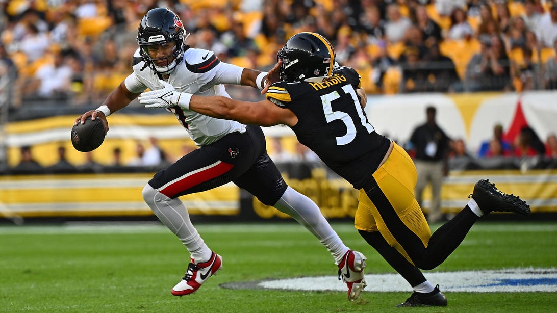 PITTSBURGH, PENNSYLVANIA - AUGUST 09: C.J. Stroud #7 of the Houston Texans scrambles under pressure from Nick Herbig #51 of the Pittsburgh Steelers in the first quarter during the preseason game at Acrisure Stadium on August 9, 2024 in Pittsburgh, Pennsylvania.