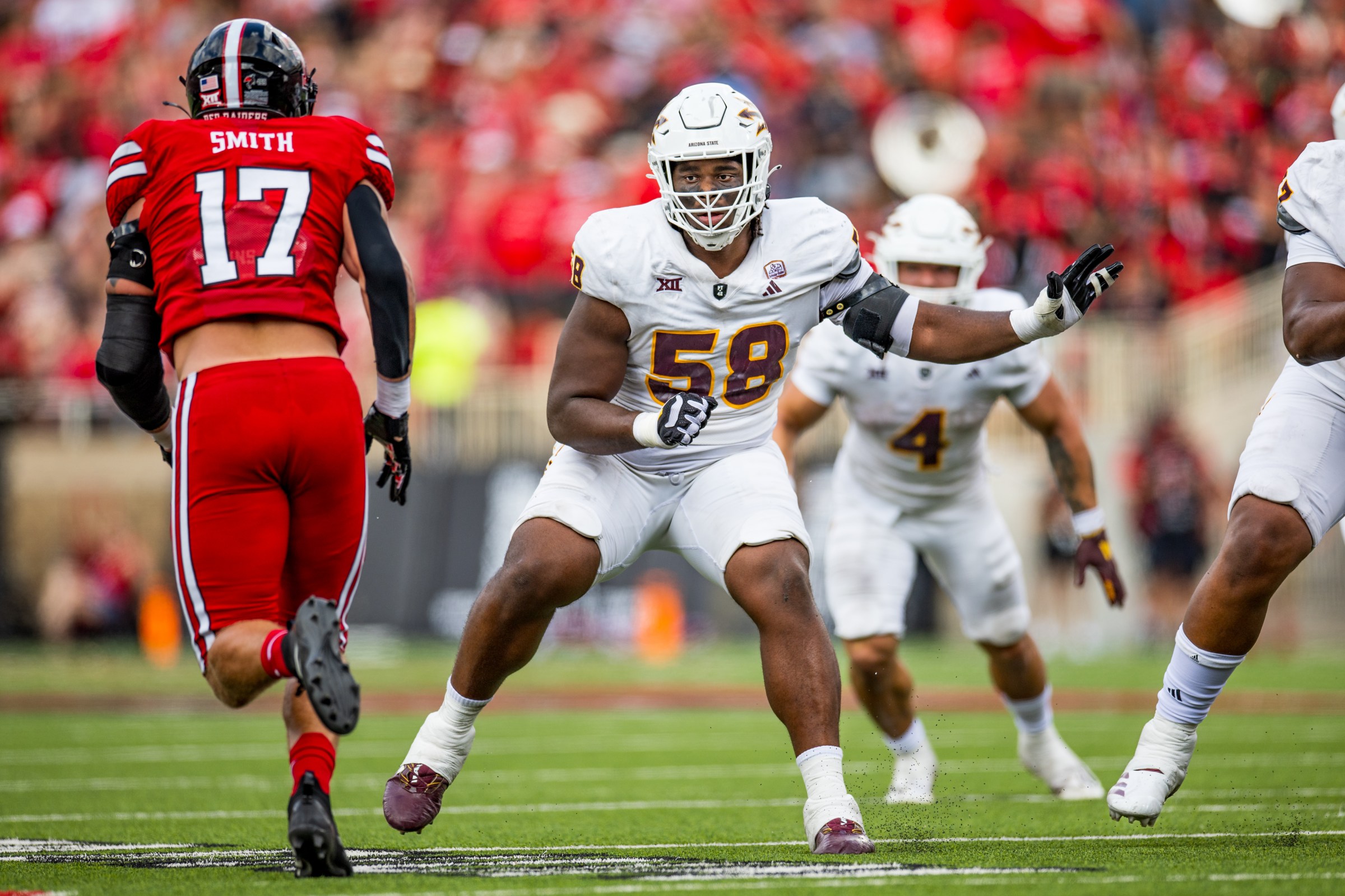 LUBBOCK, TEXAS - SEPTEMBER 21: Max Iheanachor #58 of the Arizona State Sun Devils prepares to block during the first half of the game against the Texas Tech Red Raiders at Jones AT&T Stadium on September 21, 2024 in Lubbock, Texas. (Photo by John E. Moore III/Getty Images)
