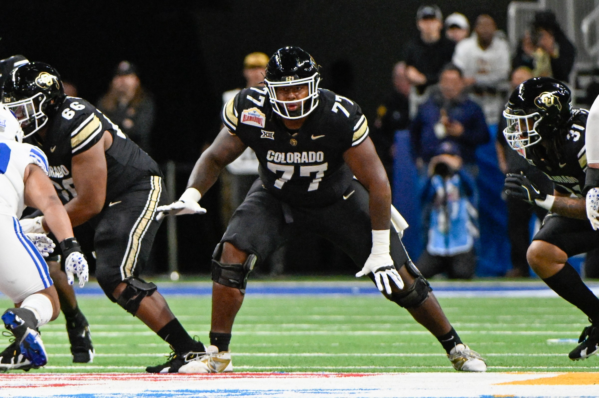 Colorado Buffaloes offensive tackle Jordan Seaton (77)