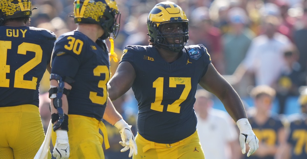 DL Enow Etta withdrawing from transfer portal, returning to Michigan