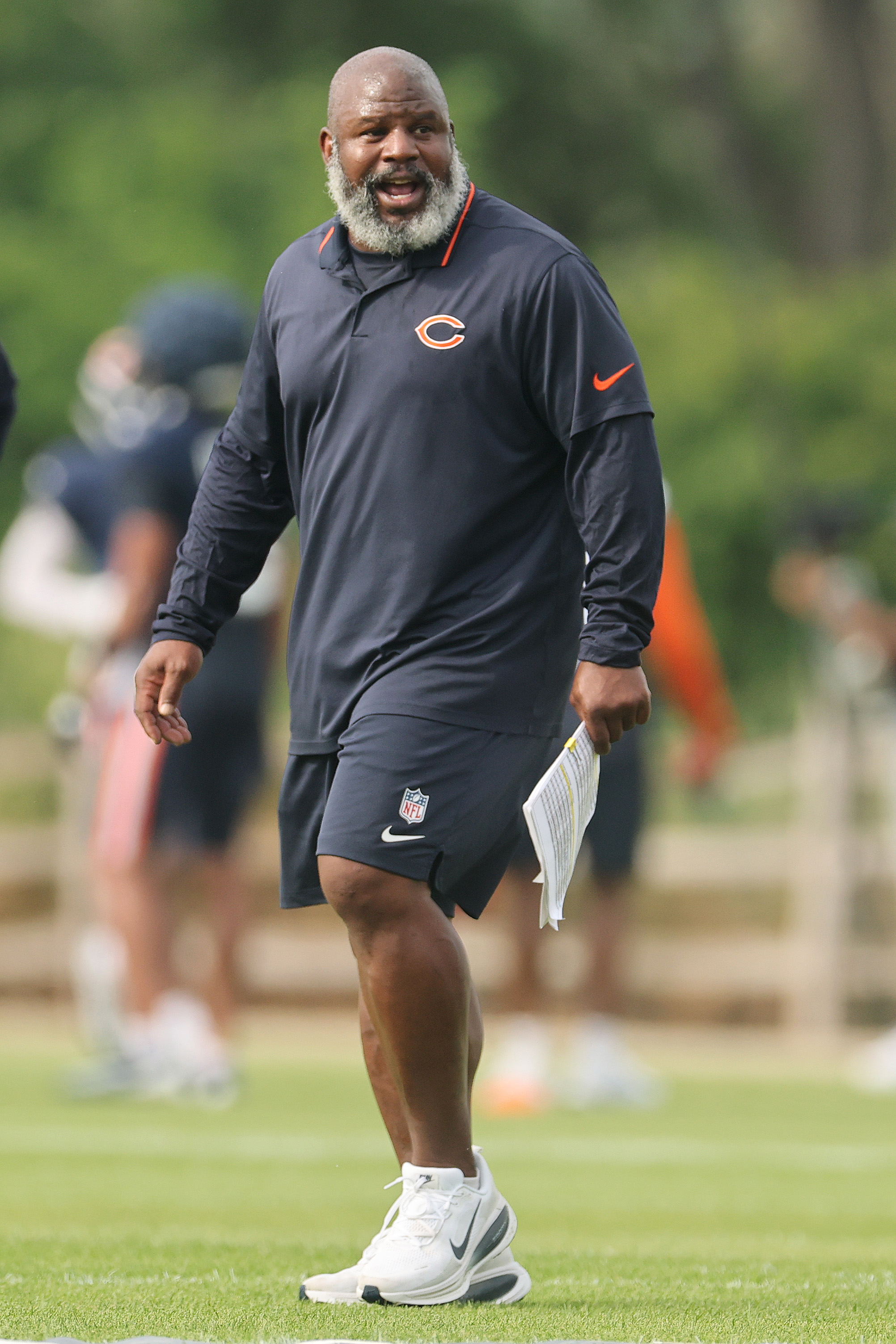 LAKE FOREST, ILLINOIS - JULY 28: Running backs coach Eric Bieniemy of the Chicago Bears looks on during Chicago Bears Training Camp at Halas Hall on July 28, 2025 in Lake Forest, Illinois. (Photo by Michael Reaves/Getty Images)