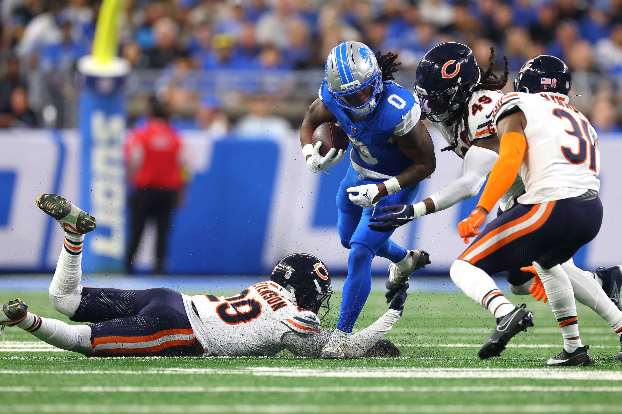 DETROIT, MICHIGAN - SEPTEMBER 14: Jahmyr Gibbs #0 of the Detroit Lions plays against the Chicago Bears at Ford Field on September 14, 2025 in Detroit, Michigan. (Photo by Gregory Shamus/Getty Images)