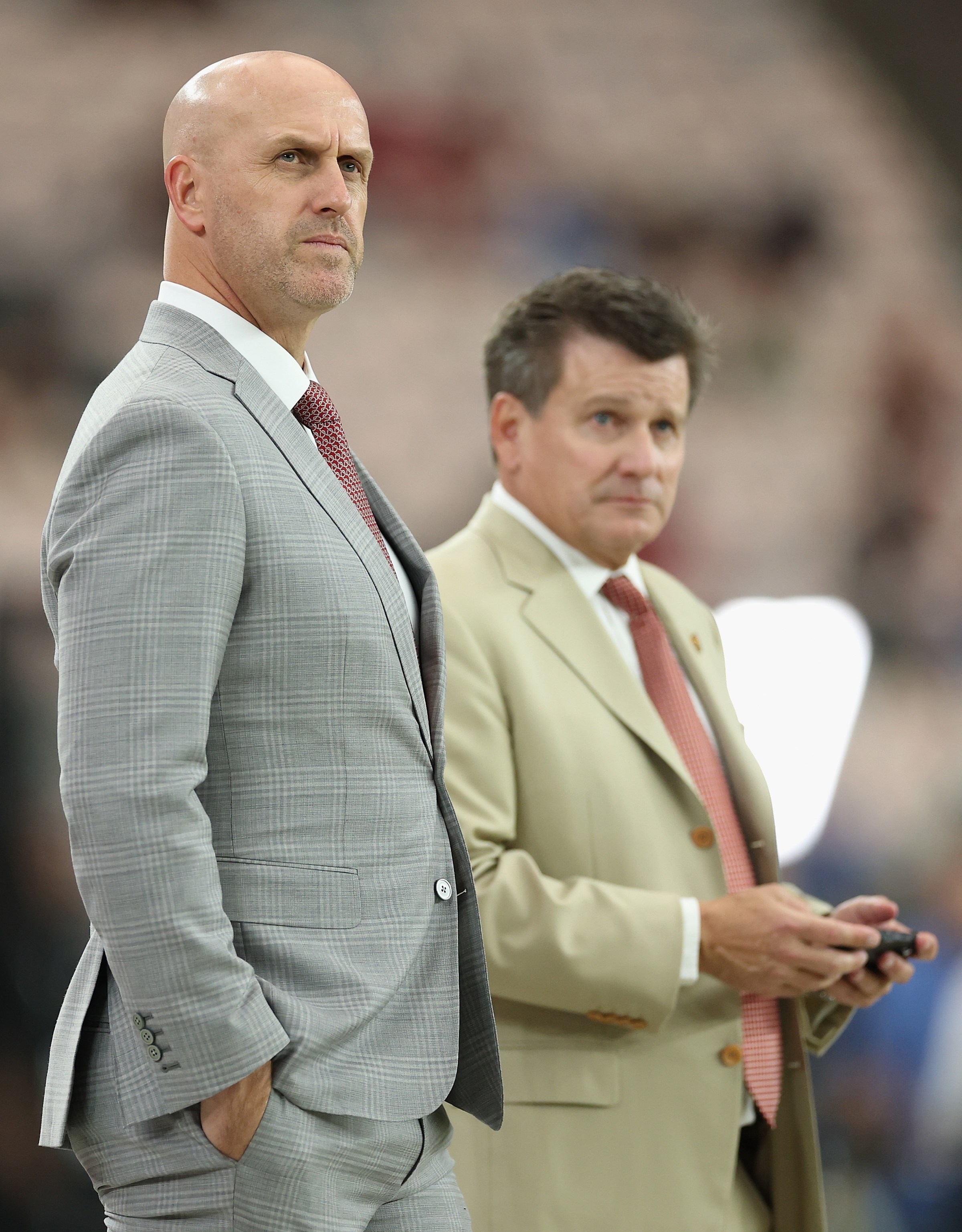 GM Monti Ossenfort, left, and Arizona owner Michael J. Bidwill