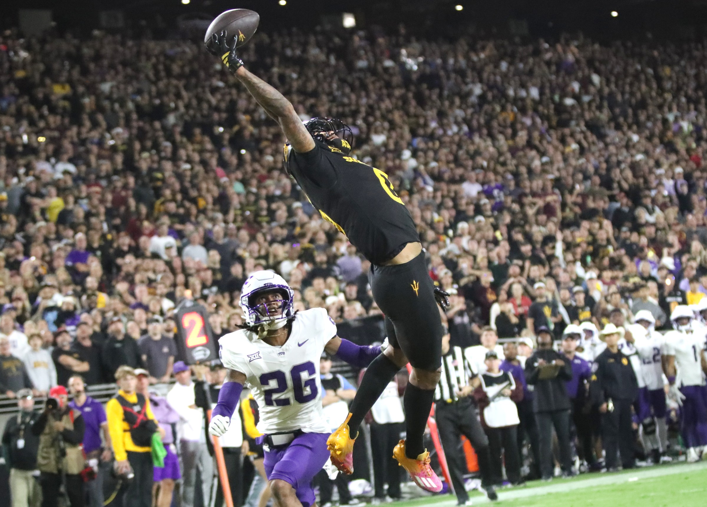 TEMPE, ARIZONA - SEPTEMBER 26: Wide receiver Jordyn Tyson #0 of the Arizona State Sun Devils attempts to make a catch in the endzone during the second half of the Texas Christian University Horned Frogs versus the Arizona State Sun Devils football game at Mountain America Stadium on September 26, 2025 in Tempe, Arizona. (Photo by Bruce Yeung/Getty Images)