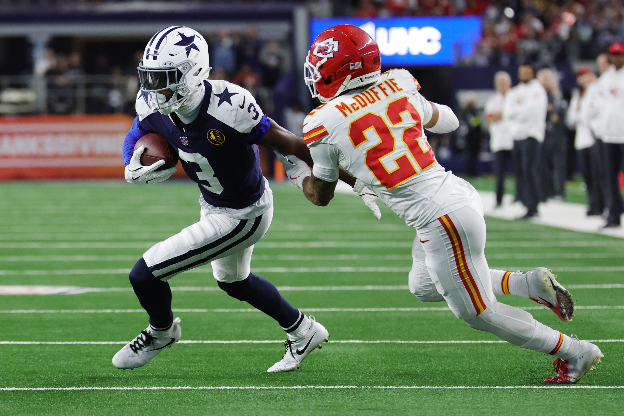 ARLINGTON, TEXAS - NOVEMBER 27: George Pickens #3 of the Dallas Cowboys carries the ball against Trent McDuffie #22 of the Kansas City Chiefs during the fourth quarter in the game at AT&T Stadium on November 27, 2025 in Arlington, Texas. (Photo by Stacy Revere/Getty Images)