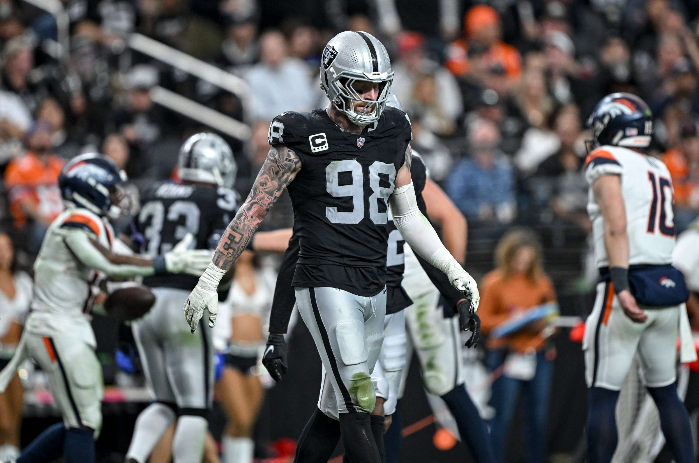 LAS VEGAS , NV - DECEMBER 7: Maxx Crosby (98) of the Las Vegas Raiders hangs his head after a first down by RJ Harvey (12) of the Denver Broncos during the third quarter of the Broncos’ 24-17 win at Allegiant Stadium in Las Vegas, Nevada on Sunday, December 7, 2025. (Photo by AAron Ontiveroz/The Denver Post)