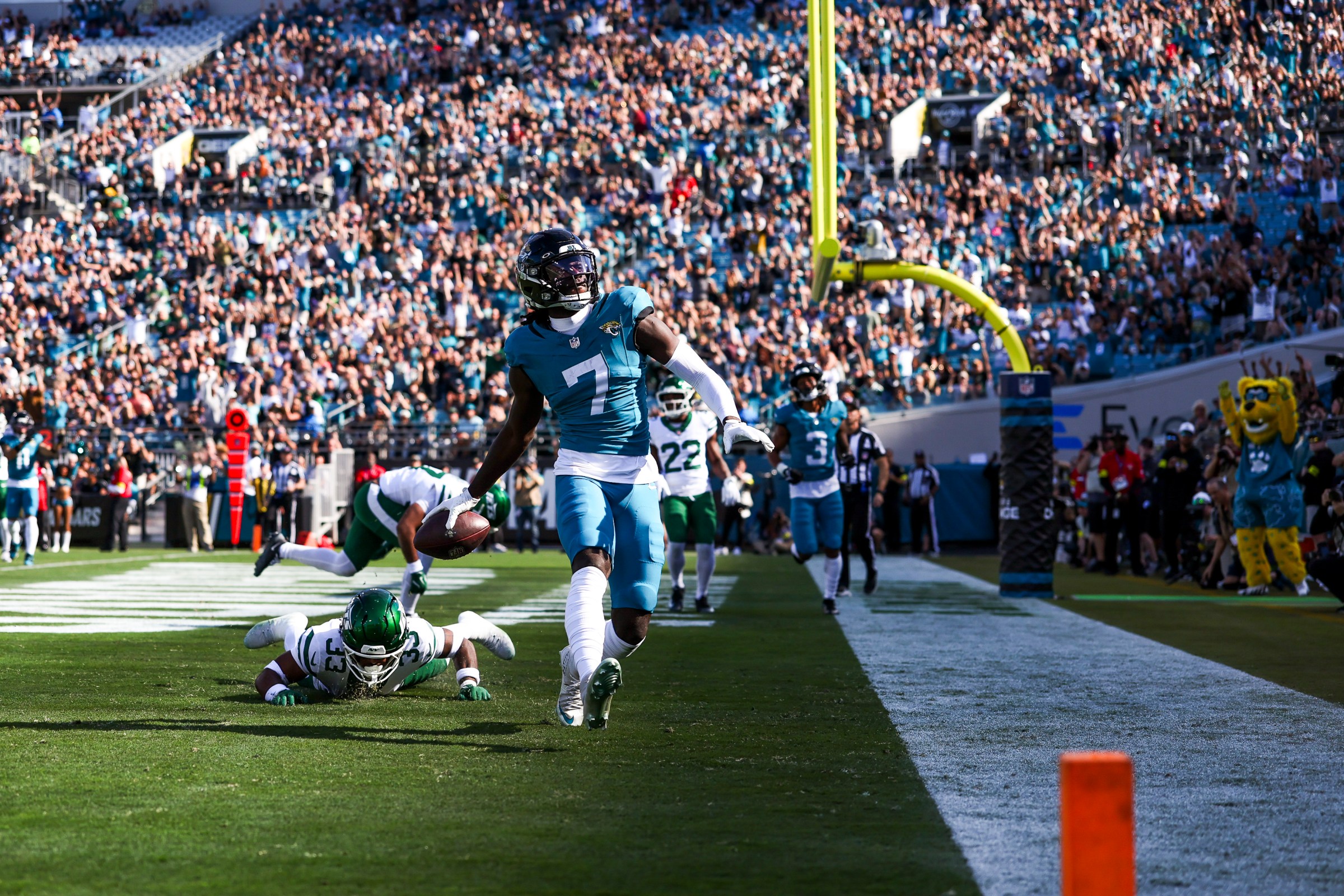 JACKSONVILLE, FLORIDA - DECEMBER 14: Brian Thomas Jr. #7 of the Jacksonville Jaguars celebrates a touchdown during an NFL 2025 game against the New York Jets at Everbank Stadium on December 14, 2025 in Jacksonville, Florida. (Photo by Logan Bowles/Getty Images)