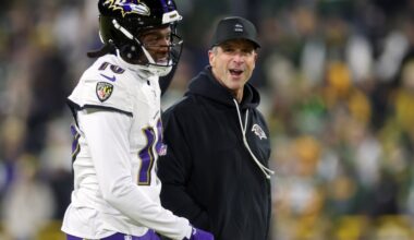 Jon Harbaugh watching film on Titans Cam Ward