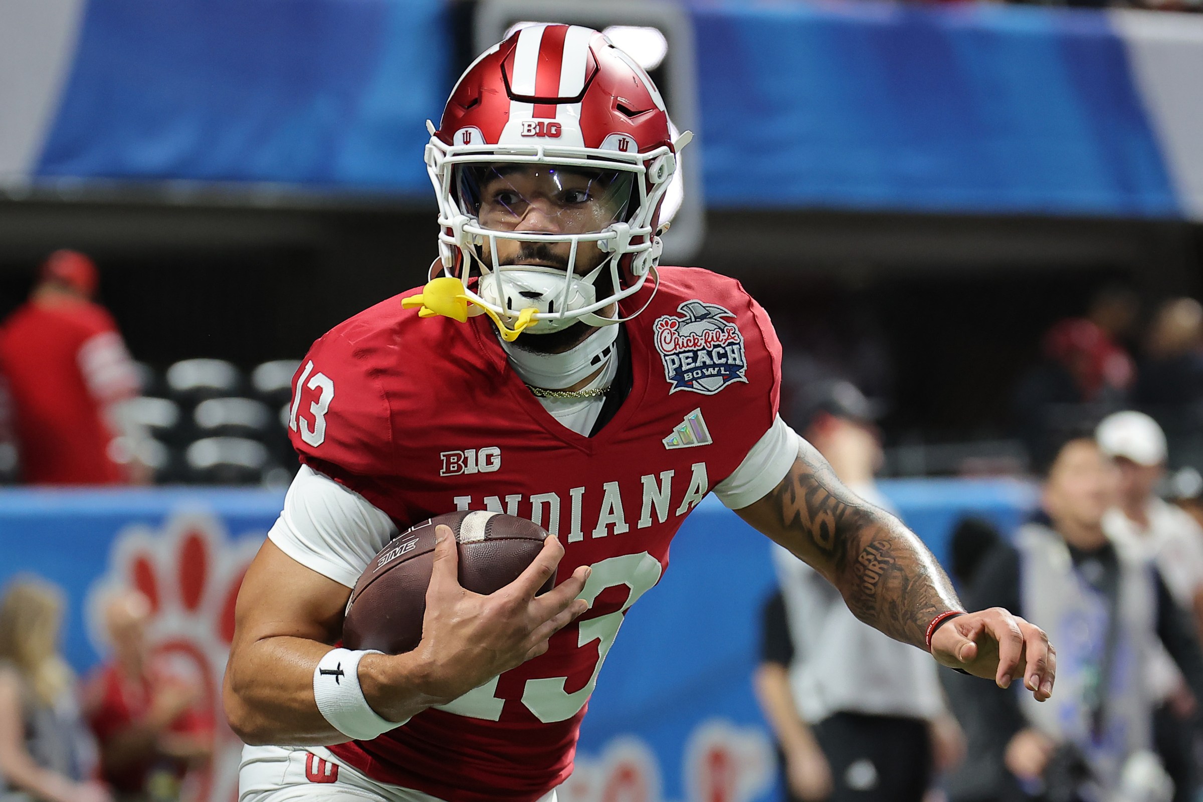 ATLANTA, GEORGIA - JANUARY 09: Elijah Sarratt #13 of the Indiana Hoosiers warms up before the 2025 College Football Playoff Semifinal at the Chick-fil-A Peach Bowl against the Oregon Ducks at Mercedes-Benz Stadium on January 09, 2026 in Atlanta, Georgia. (Photo by Jonathan Bachman/Getty Images)