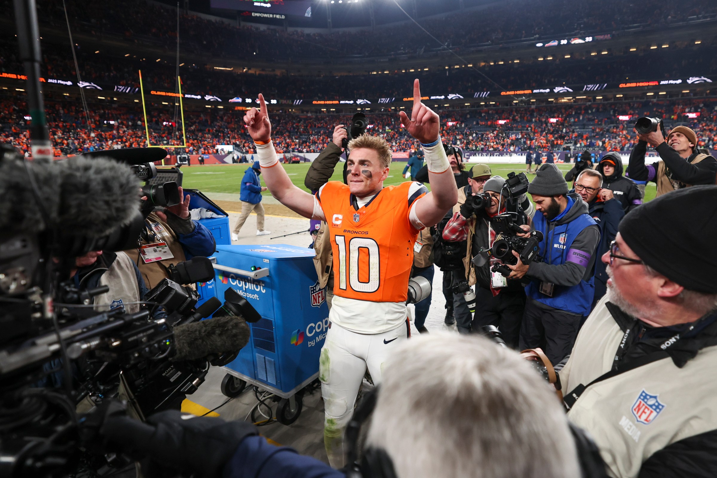 DENVER, COLORADO - JANUARY 17: Bo Nix #10 of the Denver Broncos celebrates after the NFL football divisional playoff game against the Buffalo Bills at Empower Field At Mile High on January 17, 2026 in Denver, Colorado. (Photo by Logan Bowles/Getty Images)