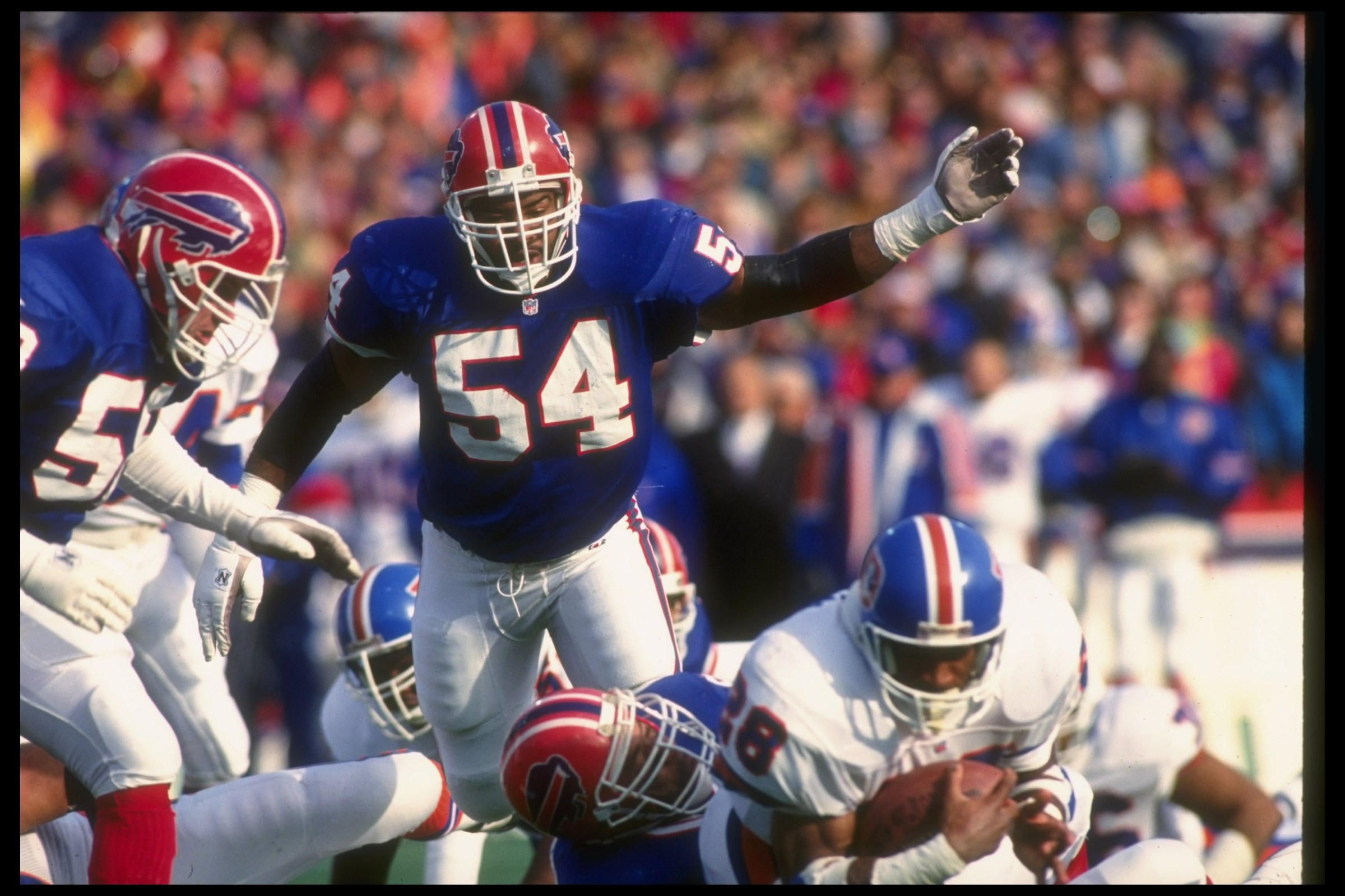 12 Jan 1992: Linebacker Carlton Bailey of the Buffalo Bills works against the Denver Broncos during a playoff game at Rich Stadium in Orchard Park, New York. The Bills won the game, 10-7. Mandatory Credit: Rick Stewart /Allsport