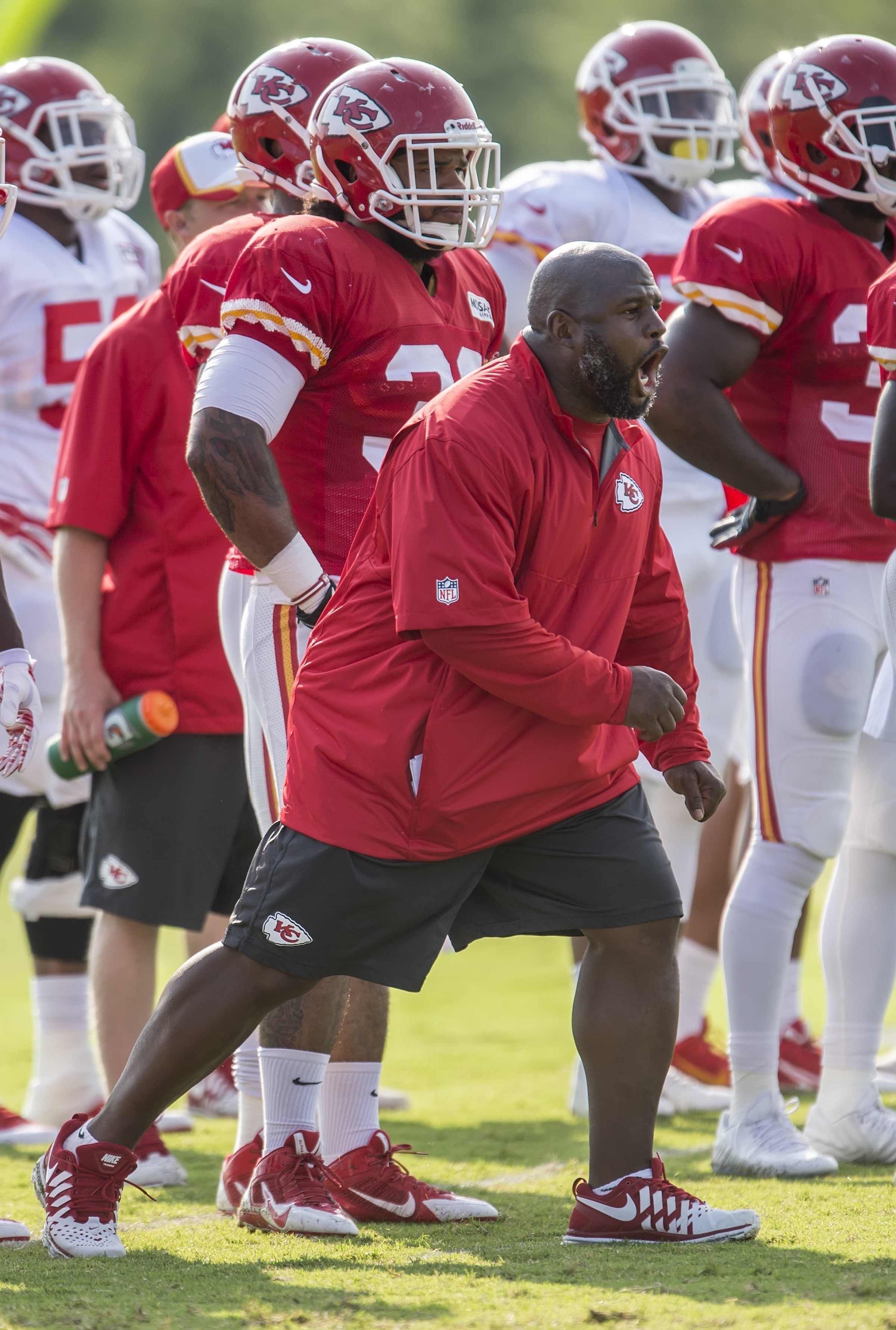Kansas City Chiefs running backs coach Eric Bieniemy shouts during drills on August 4, 2014, during training camp practice at Missouri Western State University in St. Joseph, Mo. (David Eulitt/Kansas City Star/Tribune News Service via Getty Images)