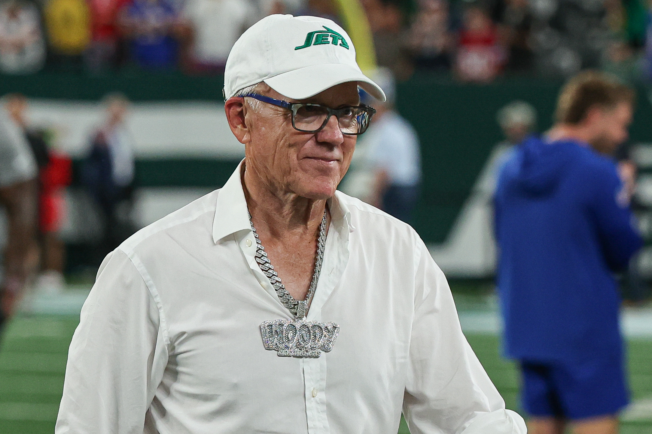 Sep 11, 2023; East Rutherford, New Jersey, USA; New York Jets owner Woody Johnson on the field before the game against the Buffalo Bills at MetLife Stadium. Mandatory Credit: Vincent Carchietta-Imagn Images
