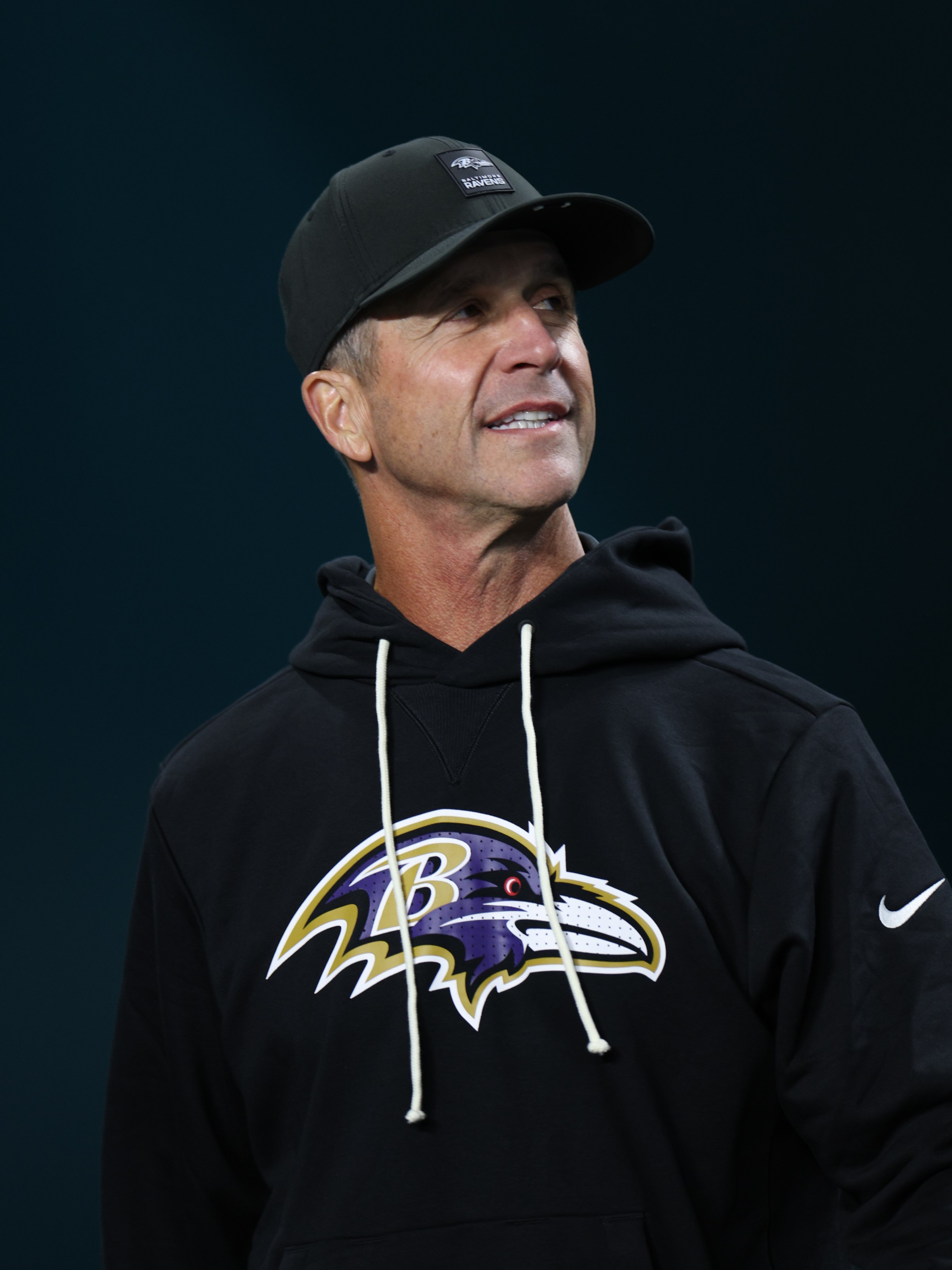 Oct 30, 2025; Miami Gardens, Florida, USA; Baltimore Ravens head coach John Harbaugh stands on the sidelines prior to a game against the Miami Dolphins at Hard Rock Stadium. Mandatory Credit: Nathan Ray Seebeck-Imagn Images