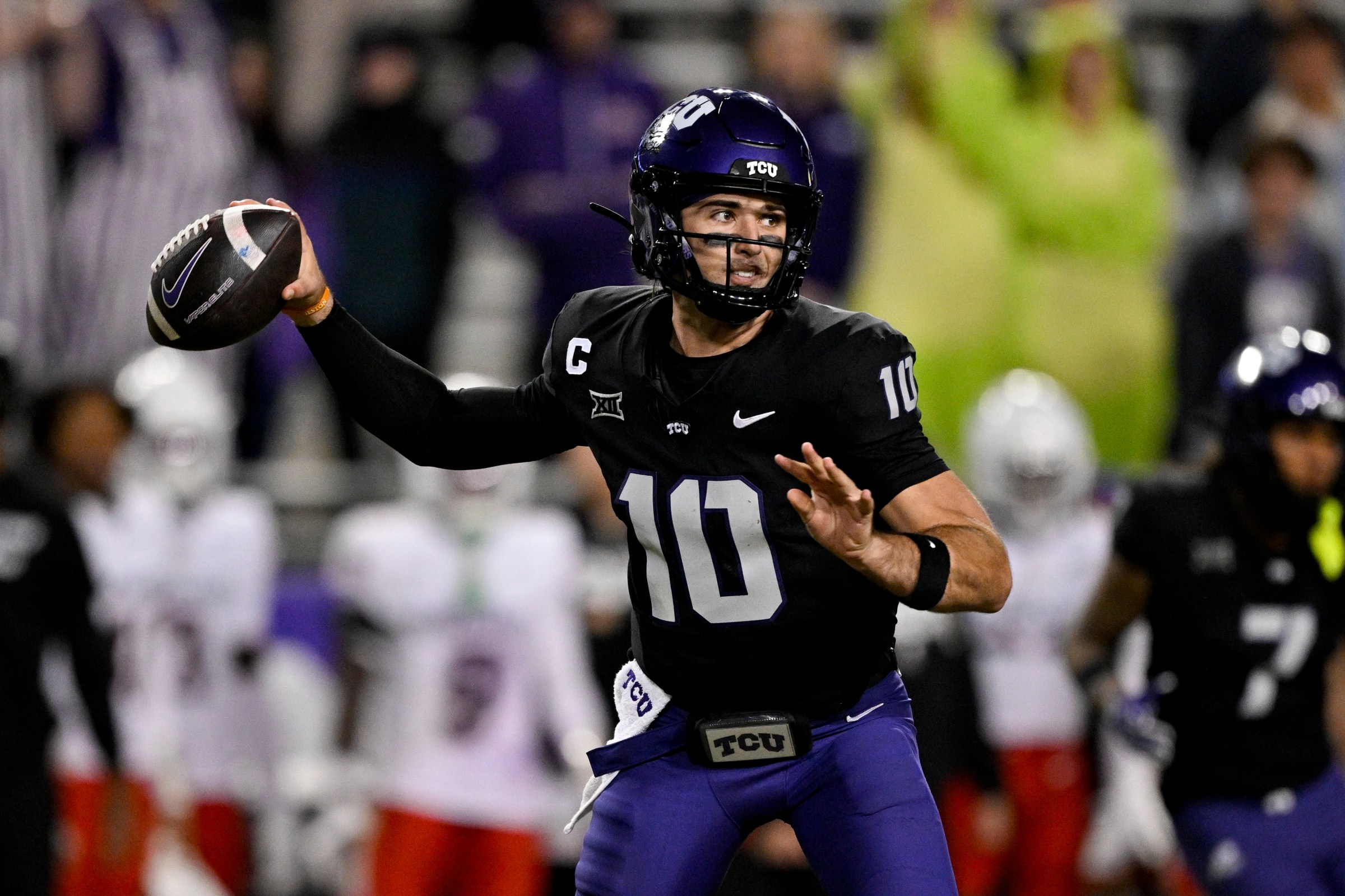 Nov 29, 2025; Fort Worth, Texas, USA; TCU Horned Frogs quarterback Josh Hoover (10) throws the ball during the second half against the Cincinnati Bearcats at Amon G. Carter Stadium. Mandatory Credit: Jerome Miron-Imagn Images