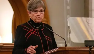 KS gov touts Chiefs deal, calls for banning phones in schools