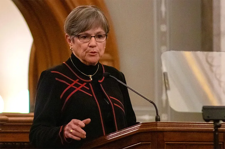 KS gov touts Chiefs deal, calls for banning phones in schools