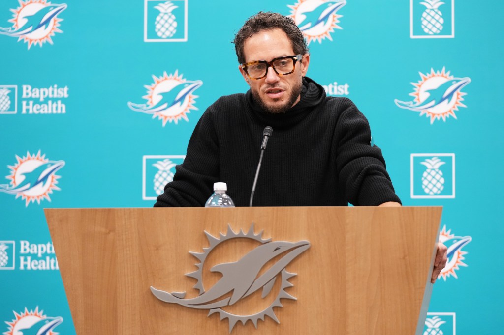 Miami Dolphins head coach Mike McDaniel responding to a question at a news conference.