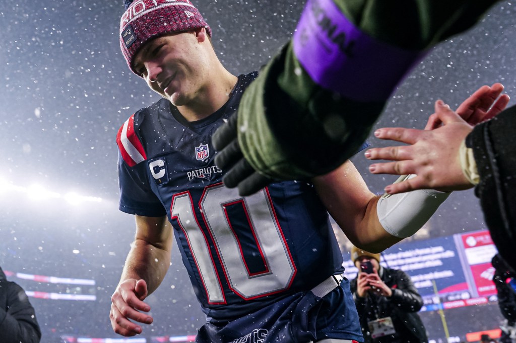 New England Patriots quarterback Drake Maye (10) exits the field after defeating the Houston Texans.