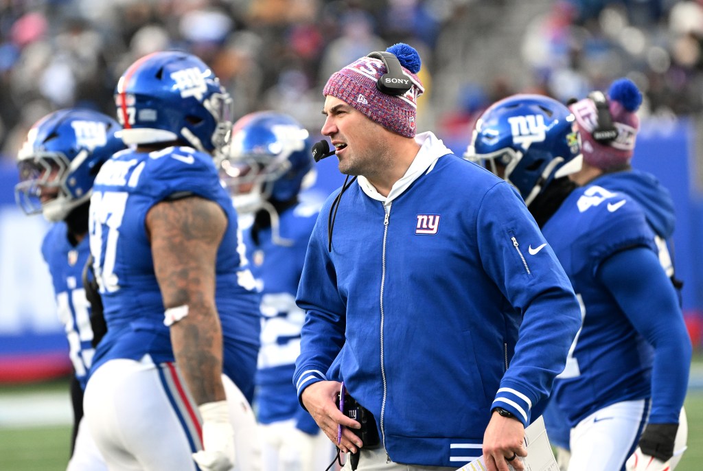 Giants head coach Mike Kafka on the sideline during a game.