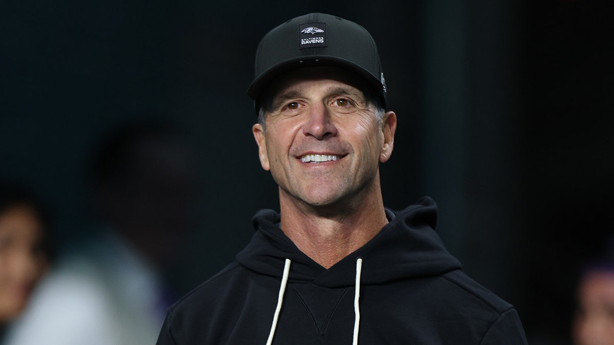 John Harbaugh smiles