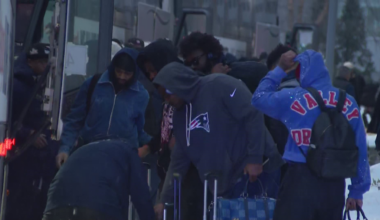 Patriots arrive back in New England fresh off AFC title win