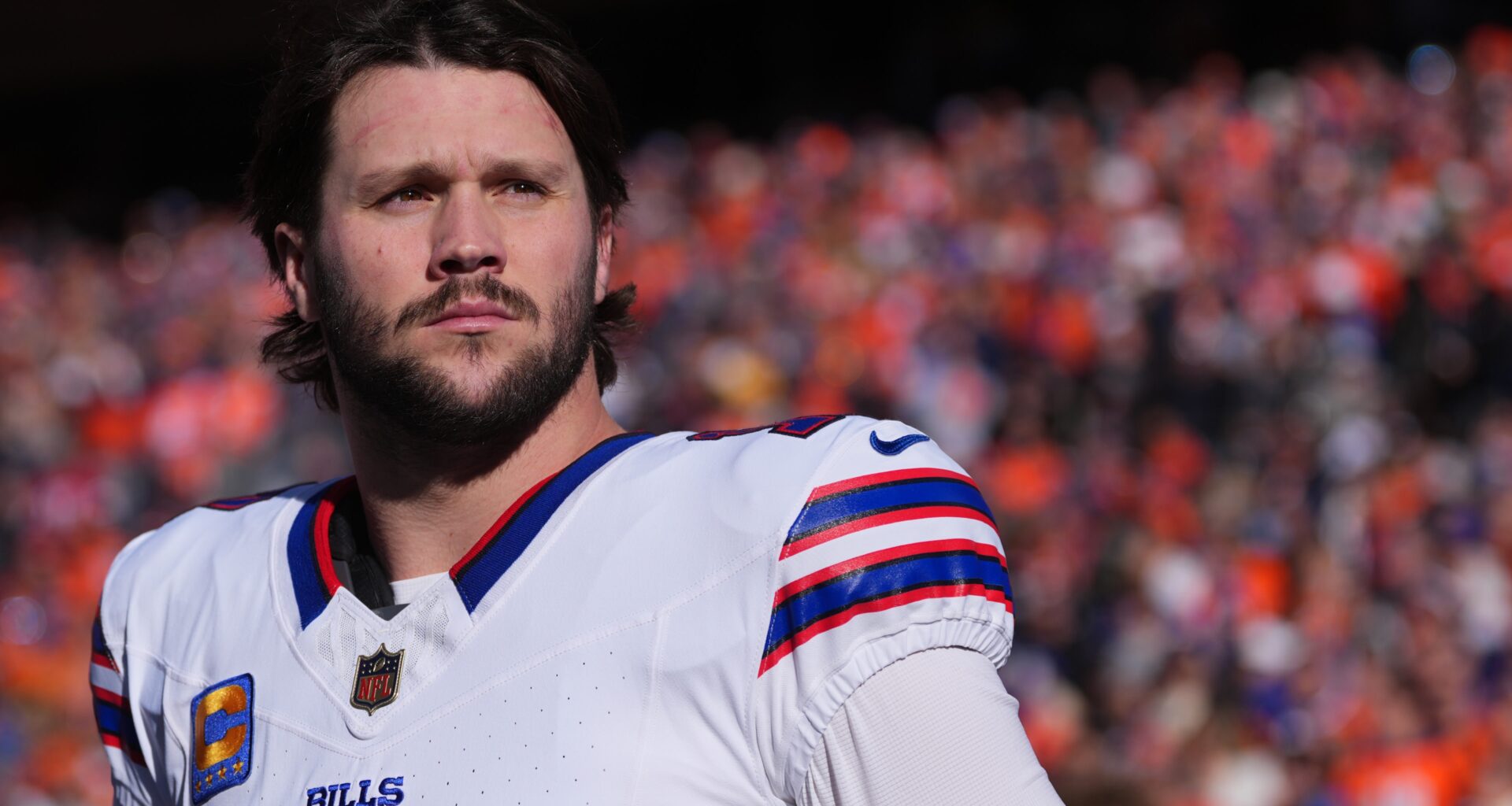 Josh Allen #17 of the Buffalo Bills looks on against the Denver Broncos during the national anthem during an AFC Divisional Playoff game at Empower Field at Mile High on January 17, 2026 in Denver, Colorado.
