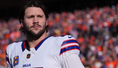 Josh Allen #17 of the Buffalo Bills looks on against the Denver Broncos during the national anthem during an AFC Divisional Playoff game at Empower Field at Mile High on January 17, 2026 in Denver, Colorado.