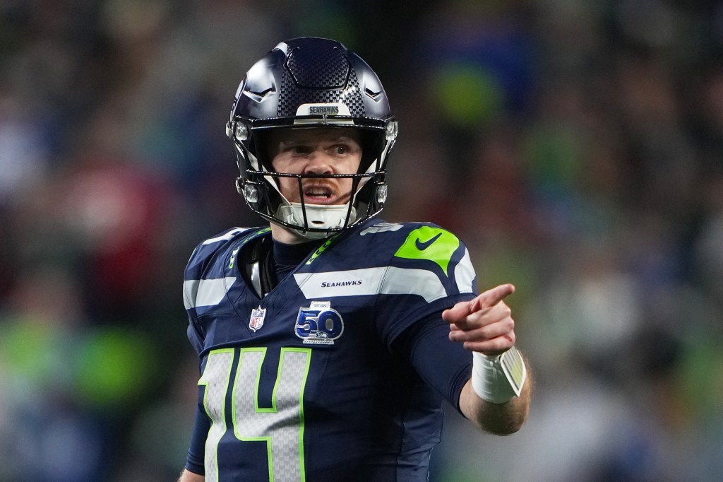 Seattle Seahawks quarterback Sam Darnold reacting.