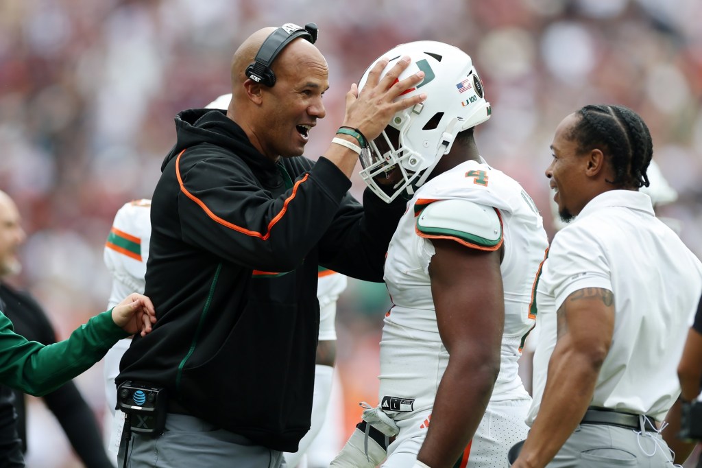 Jason Taylor, proud football papa, helped UM's Bain, Mesidor become stars
