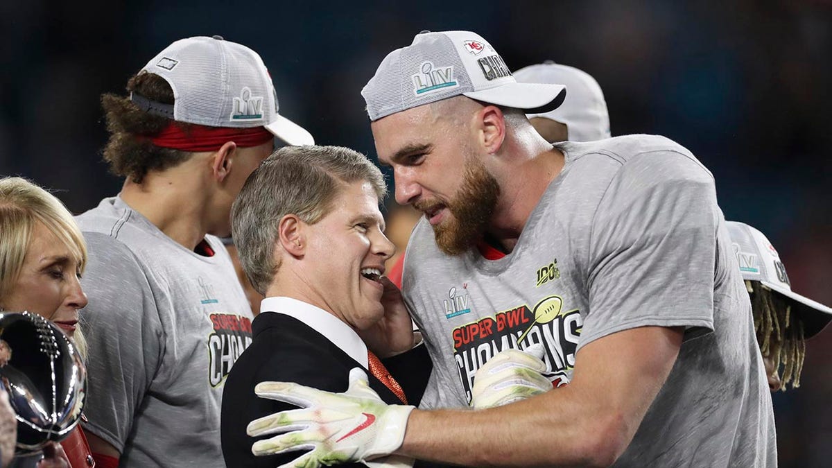 Travis Kelce interacts with Clark Hunt