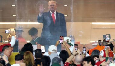 Trump cheered by CFP national championship game crowd during national anthem at Indiana-Miami clash