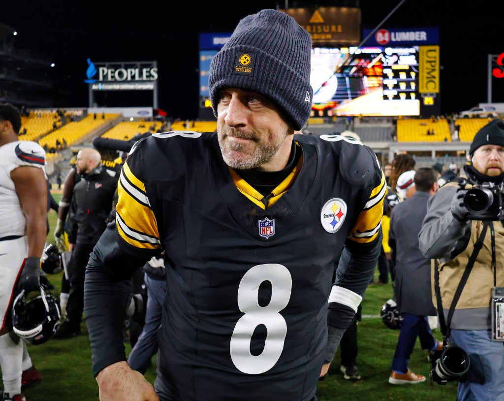 Pittsburgh Steelers quarterback Aaron Rodgers (8) walks off the field.